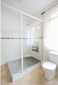 Clean private bathroom at Naibor Villa