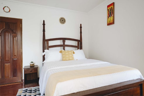 King bed setup in one of the villa rooms