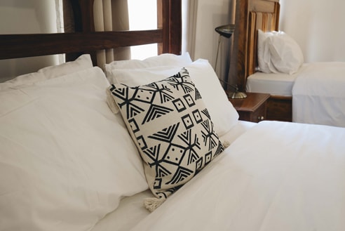 Comfortable bedding in a guest room